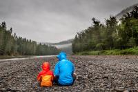Father talking under the rain