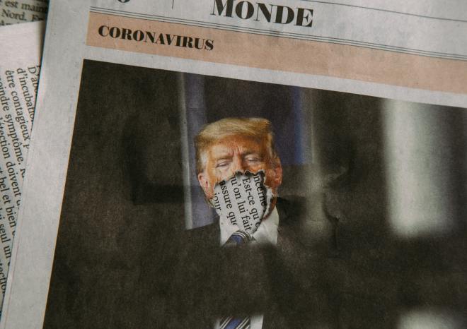 President Donald Trump and a newspaper clipping of the coronavirus