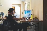 Man at desk with computer