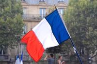 French flag (Photo by Jeremy Bezanger on Unsplash)