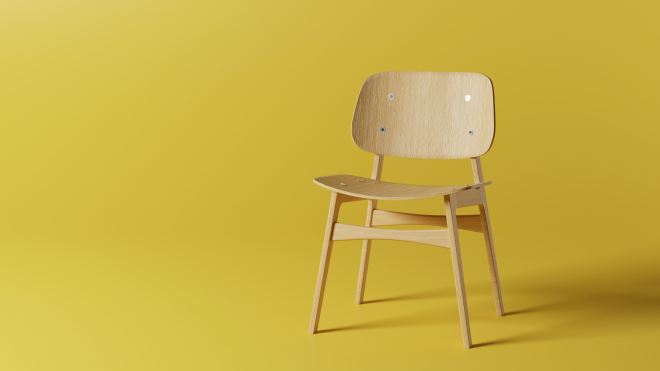 Wooden chair against yellow background (Photo by YU Carla on Unsplash)