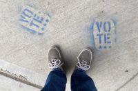Sidewalk art of voting (Photo by Phil Scroggs on Unsplash)