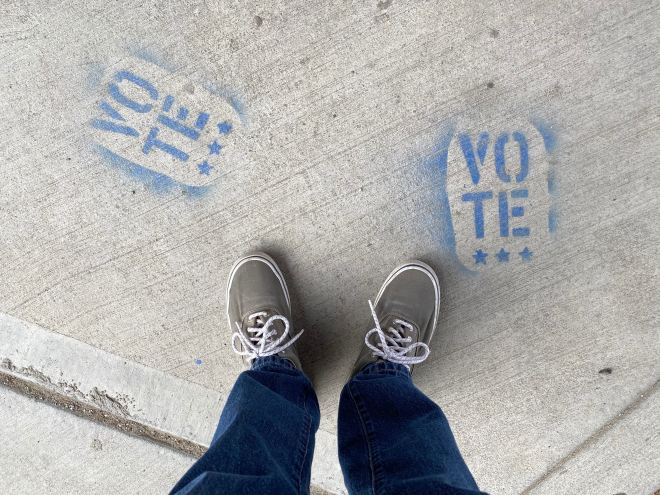 Sidewalk art of voting (Photo by Phil Scroggs on Unsplash)